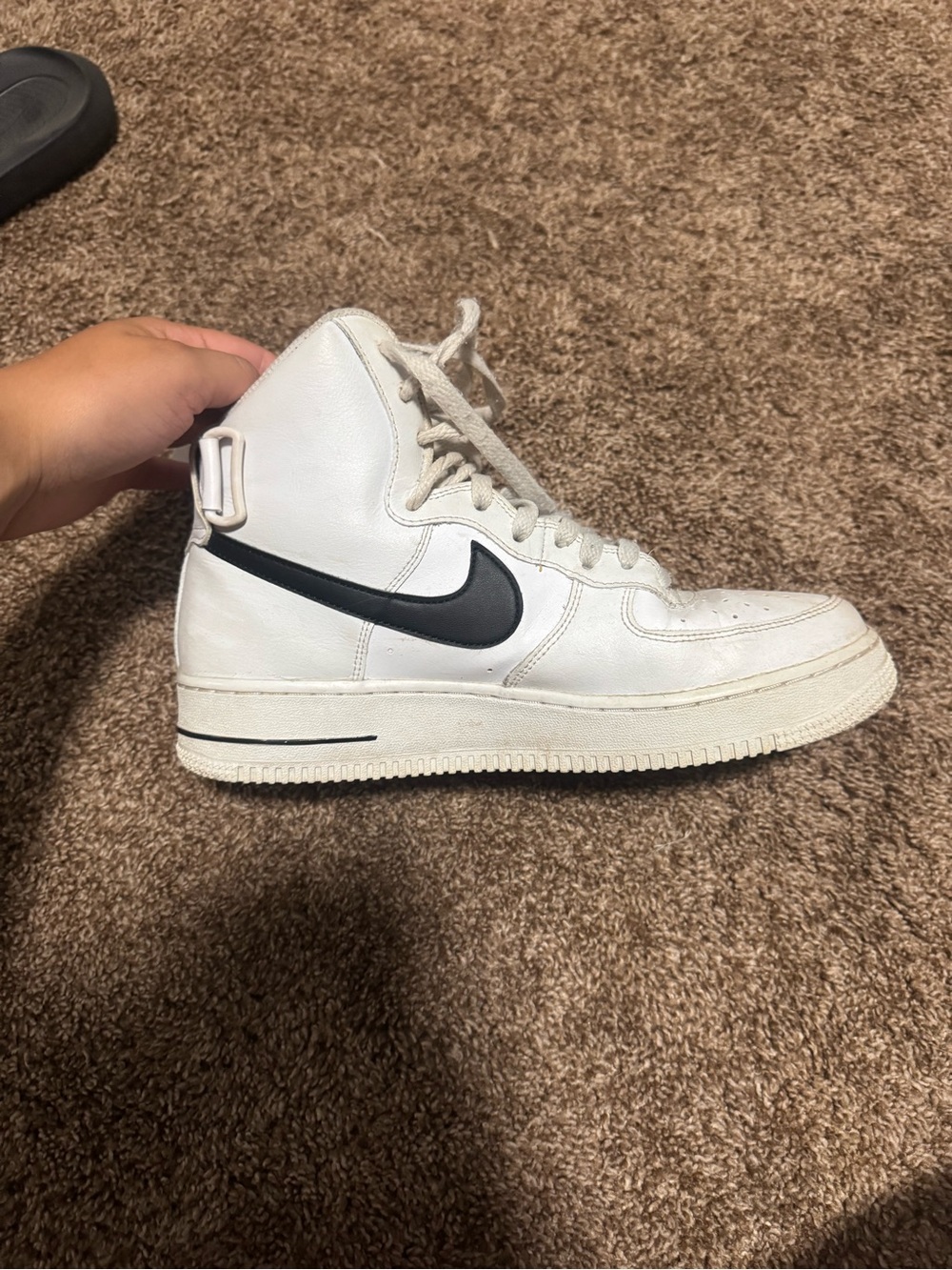 Nike White High-Top Sneakers with Black Swoosh Accent